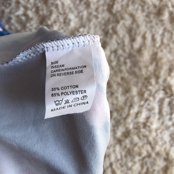 Flowered navy wrap style dress with sleeves - Picture 7 of 7